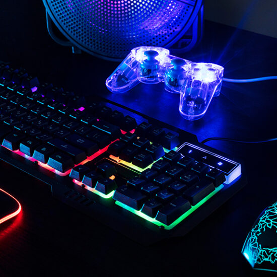 view-illuminated-neon-gaming-keyboard-setup-controller